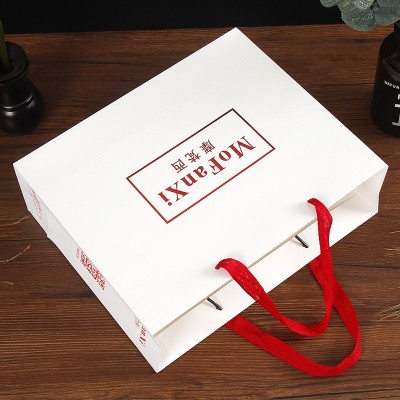 哇噢定制--白卡纸袋服装广告购物礼品包装手提袋化妆品礼品 袋定做图2