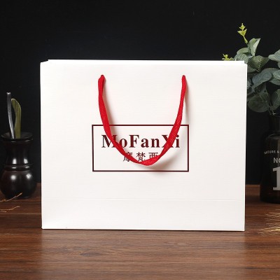 哇噢定制--白卡纸袋服装广告购物礼品包装手提袋化妆品礼品 袋定做图5
