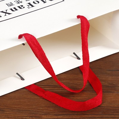 哇噢定制--白卡纸袋服装广告购物礼品包装手提袋化妆品礼品 袋定做图3