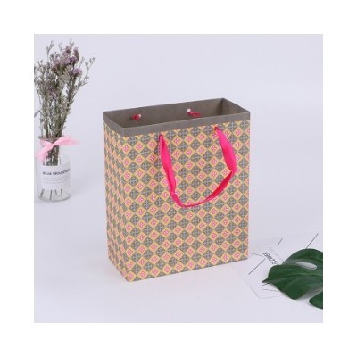 彩印LOGO纸袋生产礼品手提袋 白色牛皮纸服装纸袋厂家批发可订图2