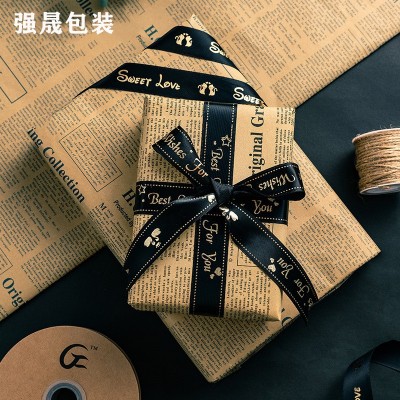 礼品花束包装纸情人节包花纸牛皮纸可降解英文报纸鲜花包装纸材料图2