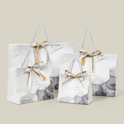 ins风礼品袋时尚蝴蝶结服装店包装袋大理石纹手提礼品袋lo go印刷图8