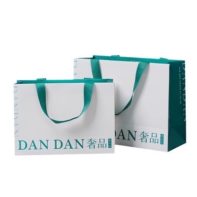 服装店手提袋定 制印刷logo纸袋白卡纸礼品袋手提纸袋定 做高级感