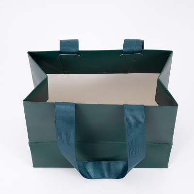 收藏 0分享 30扫一扫举报 手提袋定制 礼品袋 服装手提袋定制 单铜纸购物袋 厂家批发可定制图3