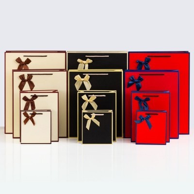 现货蝴蝶结纸袋批发节日礼品袋加厚服装首饰包装袋手提袋定制logo图3