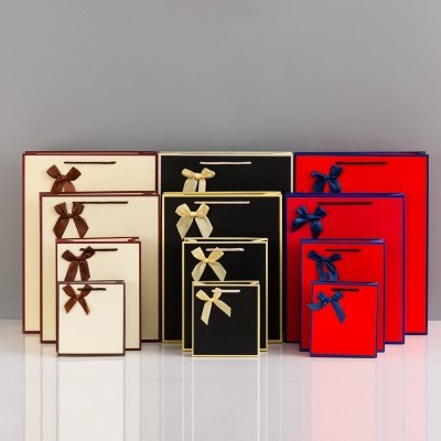 现货蝴蝶结纸袋批发节日礼品袋加厚服装首饰包装袋手提袋定制logo图4