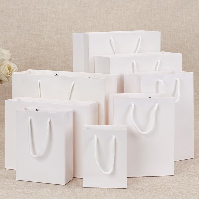 牛皮纸袋手提袋定制手拎包装礼品袋礼物服装店衣服女装订做印logo图2