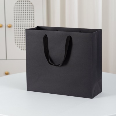 高颜值纸质手提袋牛皮纸袋礼品袋服装店衣服手挽袋印logo大量现货图2